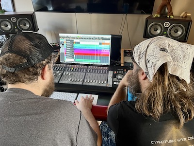 Justin Holmes and Jake Stargel looking over a take of Barlow's Jig  at the Stargel Studios console.